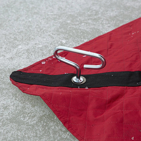Self Tapping Ice Shelter Anchors Stainless Steel Screw In Two Pack securing a red ice tent on an icy surface