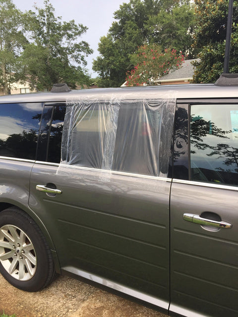 Car Window Repair Tape Wrap 17.5 Inch Wide Clear Adhesive Film 6 Ft Long Waterproof Tacky Tape For Temporary Car Window Fix Easy To Apply Auto Window Patch on a car window.