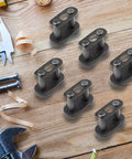 Number 35 Chain Master Link Eight Pack Heavy Duty Steel Quick Release Connector for mini bike and ATV repair parts, displayed on a workbench.