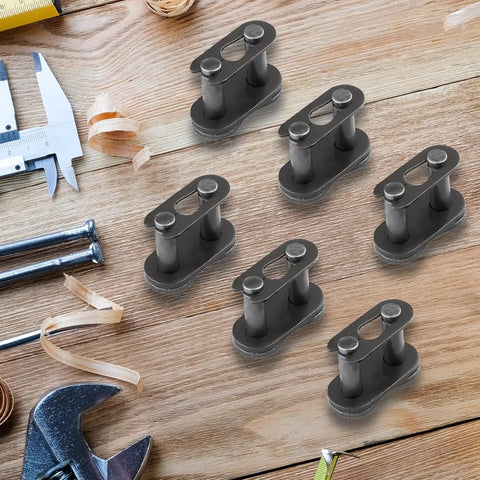 Number 35 Chain Master Link Eight Pack Heavy Duty Steel Quick Release Connector for mini bike and ATV repair parts, displayed on a workbench.