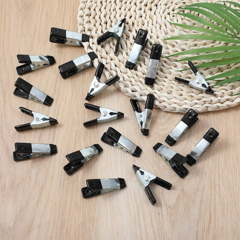 20 Pack Small Clamps For Garden And Crafts, Mini Heavy Duty Spring Clamps With Three Quarter Inch Jaw Opening on table