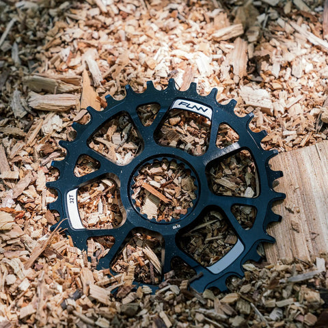 Narrow Wide 30T Direct Mount Chainring For Shimano MTB Cranks on wood chips, One Piece 7075 Aluminum CNC Finish