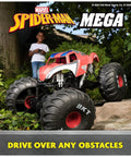 Spider Man RC Monster Truck Mega Size Over Two Feet Long One Six Scale All Terrain Off Road Toy For Kids Four And Up with large wheels on rocky terrain.
