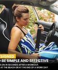 Woman using Go-To Universal Fit Waterproof Car Seat Cover With Neoprene, non-slip, black seat protector in an auto