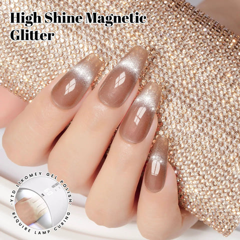 Cat Eye Gel Nail Polish Set With Magnetic 3D Glitter Effect in brown shimmer finish on fingernails, holding a jeweled clutch.