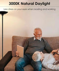 Living room scene with Torchiere LED Floor Lamp 70 Inch Tall Stepless Dimmable Pole Lamp illuminating a cozy sofa area.