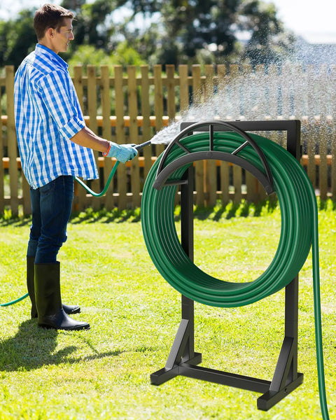 Heavy Duty Metal Garden Hose Holder And Hanger Freestanding Water Hose Storage Rack with dual hooks in use outdoors