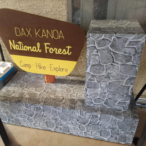 Dark Grey Fortress Stone Peel And Stick Wallpaper 394 Inch used on decorative model with national park sign