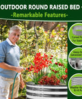 Man watering plants in a round raised garden bed made of galvanized steel, featuring stability panels and rust resistance.