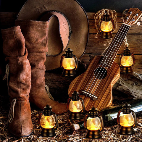 12 Pack Mini Lantern Decor 4 Inch Western Style Table Centerpiece Party Lanterns For Cowboy Cowgirl Weddings Halloween Christmas Vintage Camping Hanging Ornaments Black shown with guitar and boots.