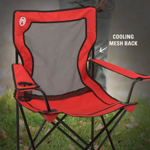 Broadband Mesh Quad Camping Chair with carry bag and cup holder, red, showing cooling mesh back and steel frame, patio setting