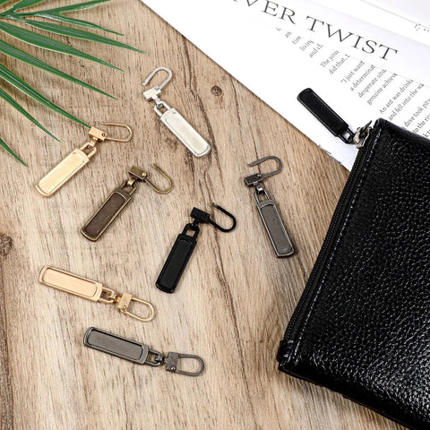 10 Piece Zipper Pull Replacement Set Silver Black Gold Copper for jackets bags luggage backpacks coats shoes displayed on table