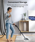 Woman using Turquoise Heavy Duty Handheld Steam Cleaner Mop 293 Degree Heat on carpet, showcasing convenient storage features.
