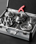 Heavy Duty Wood Lathe Chuck With Self Centering Scroll Jaw System in aluminum carry case, featuring various metallic parts and tools.