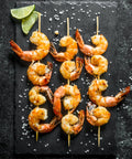 Cooked shrimp on 12 Inch Bamboo Skewers For Grillin And Barbecue 100 Count Wooden Kabob Sticks For Shish Kabob