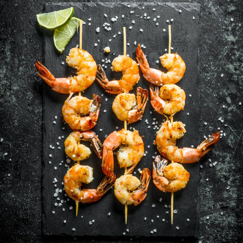 Cooked shrimp on 12 Inch Bamboo Skewers For Grillin And Barbecue 100 Count Wooden Kabob Sticks For Shish Kabob