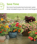 No Fuss Drip Watering System With Timer For Containers And Hanging Baskets, Automatic Irrigation For Up To Twenty Plants, Includes Twenty Drippers, Black in use on various flower pots.