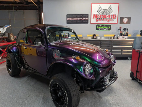 Fresh Shop Grade Superflake Colorshift Basecoat Paint Gallon Ready To Spray applied on a custom purple and green off-road bug.