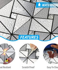 Close-up of waterproof 10-Sheet Peel And Stick Backsplash Tile Set for Kitchen Fireplace and Bathroom with water droplets, heat resistance, scratch proof and easy to clean features.