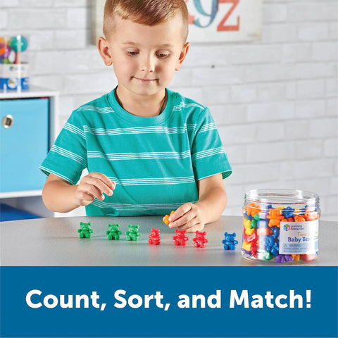 Child playing with 102 Bear Counters For Kids, Toddler Math Toys, Counting Manipulatives For Preschool And Pre K on a table.