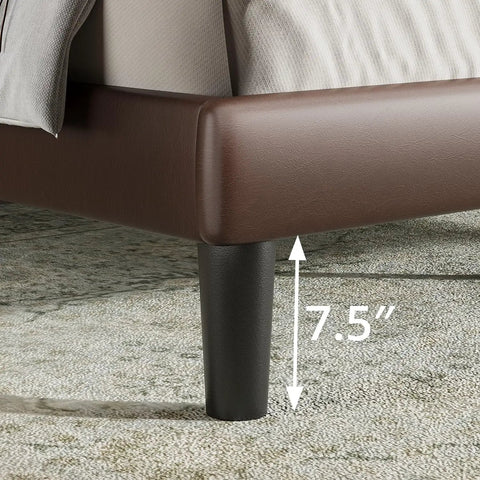 Detail of Rock Solid Heavy Duty Queen Platform Bed Frame With Tufted Wingback Headboard, showing dark brown upholstery and 7.5" leg.