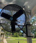 Heavy Duty Boat Dock Fan Mount For Four Inch Square Posts Featuring No Sweat Easy Installation All Weather Rust Proof Marine Grade Hardware And Swivel Tilt Design For Ultimate Backyard Chill Vibes mounted on a post.