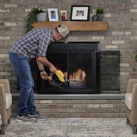 Person using Top Shelf 19 Inch Oversized Fire Bellows Hand Carved From Dense Oak Wood With Genuine Leather Accents and Rustic Studs.