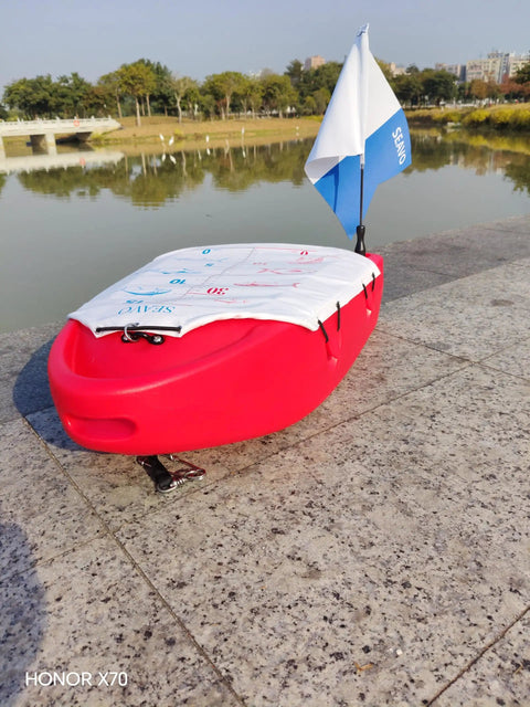 Spearfishing Float Boat With Carry Straps Foldable Flagpole And Compact Storage Red Buoy lakeside view