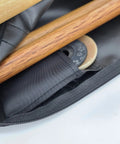 Utility Martial Arts Stick Bag For Shinai And Bokken 51 Inch Case with open zipper showing wooden shinais and bokkens inside