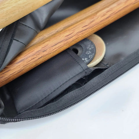 Utility Martial Arts Stick Bag For Shinai And Bokken 51 Inch Case with open zipper showing wooden shinais and bokkens inside