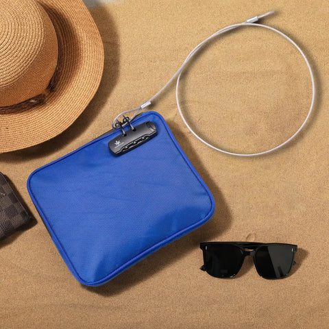 Keep Your Coastal Goods Locked Up Tight With This Travel Ready Blue Locking Bag Packing A Heavy Duty Combo Lock And Reinforced Strap For Pure Beach Day Peace Of Mind on sandy beach.