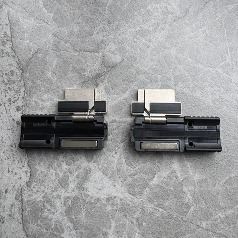 Kickass Pitch Conversion Fiber Holders paired jigs on a gray surface for 200 micron optical fiber work S017464 FH7012PC.