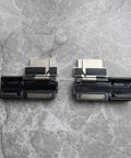 Game Changer Pitch Conversion Fiber Holders And Sheath Clamps for Glue Free Ribbonizing with Rt02 Tool on a gray surface.