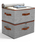 Top Shelf Washable Fabric Storage Bins With Zippered Lids And Sturdy Faux Handles Houndstooth Pattern stacked with clothes.