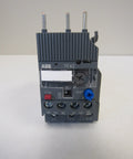 Front view of TF42-35 29 To 35 Amp IEC Overload Relay For AF Series Contactors, with controls visible and three connecting pins on top.