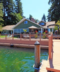 Waterfront house with dock protected by Marine Penetrating Wood Sealer And Waterproofer With Stain For High Moisture Areas Water Based Ultra Low VOC Formula