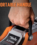 Close-up of hand gripping the handle of the Low Profile Hydraulic Floor Jack, 2.5 Ton Capacity, orange finish for cars and SUVs.