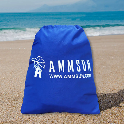 Blue Beach Umbrella Sand Anchor Bag Windproof Weight For Heavy Wind, shown on sandy beach background with ocean view.