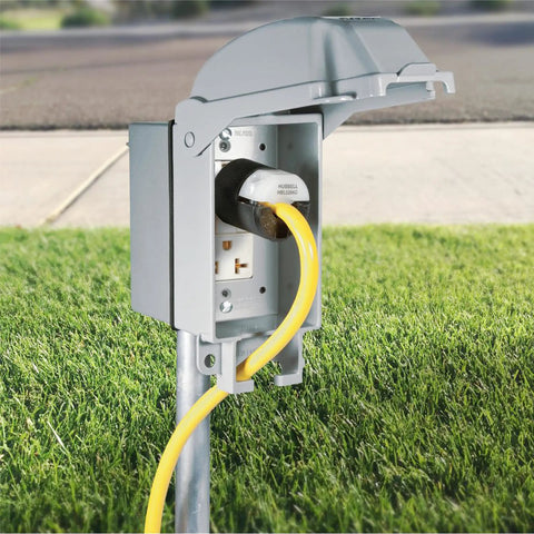 Tough As Nails One Gang Weatherproof In Use Outlet Cover With Fo Sho Quick Fit Keyhole Mount For Exterior Walls Extra Duty Rated Gray Housing tight seal against storms, showing outdoor use with a yellow cord.