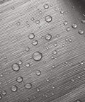 Close-up of water droplets on Heavy Duty 30x40 Ft Tarp Waterproof 10 Mil Tarpaulin, showcasing waterproof material texture.
