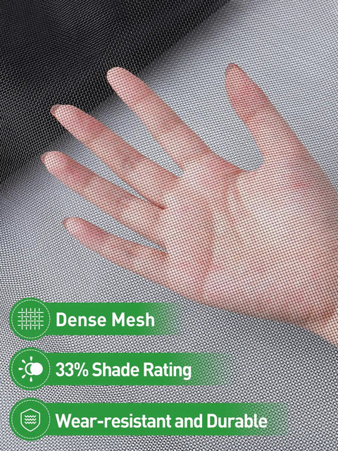 Close-up of black garden mesh showing density and hand behind, highlighting Stronger Garden Mesh Netting For Outdoor Plants And Veggies 10 X 12 Ft Black PP Nanocomposite Bird Barrier And Mosquito Screen Fits Patios Balconies Terraces With 33 Percent Shade Tear Resistant And Durable.