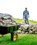 Heavy Duty Lawn Trailer With 600 Lb Capacity, 10 Cu Ft Poly Tub, Built Tough With Rugged All Steel Frame And Rust Resistant Finish in use