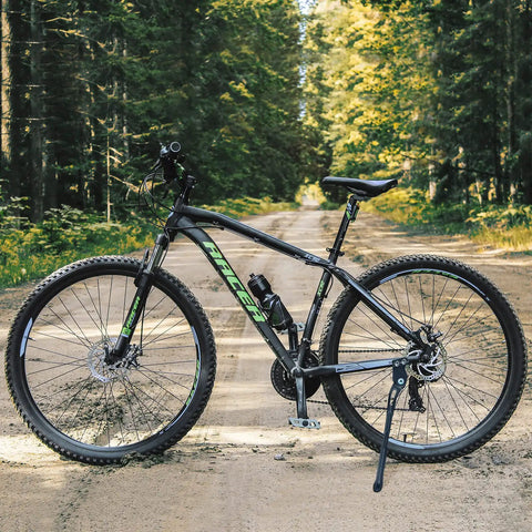 Mountain bike on trail with adjustable 18mm hole spacing bike kickstand for 24, 26, and 27.5 inch mountain bikes BMX MTB side stand.