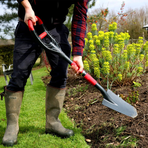 Person using Multi Digger Garden Spade With Reinforced Fiberglass Handle in garden, lightweight arrow head shovel with dual soft grip
