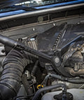 29 To 48 Inch Extendable Pry Bar With 180 Degree Rotating Head Featuring 14 Locking Positions used in a car engine compartment