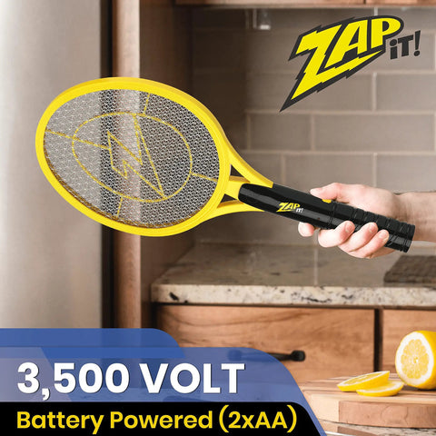 Person holding High Voltage Bug Zapper Racket With 3500 Volt Grid Battery Powered Two Pack Includes Two AAs Instant Mosquito And Fly Elimination Portable Indoor Outdoor Bug Catcher Safe Easy Push Button Activation.