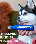 No-Fuss Rechargeable Pet Claw Grinder For Dogs And Cats Quiet Lightweight Rotary Nail Trimmer with dog resting in hand.