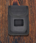 Front view of Molded Ballistic Alarm Case Nylon Tactical Pouch For CDCR And Corrections Officers on wood background