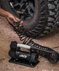 Heavy Duty Portable Air Compressor Tire Inflator Kit delivers no sweat quick fill with 3.5 CFM motor inflating truck tire.