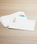 Top Shelf White Index Cards For Studying Ruled One Side Heavy Duty Notetaking Must Haves Smooth Cut Edges Perfect For Study Grinds And Quick Lists 3 By 5 Inches Bulk Pack with paperclips on a wooden surface.